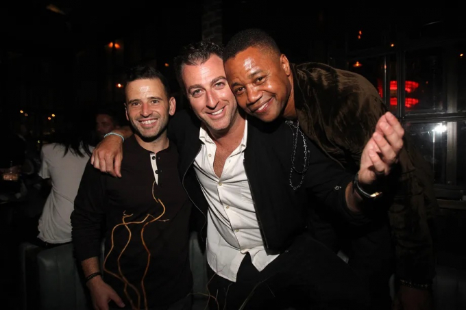 Birnbaum acompañado de su socio Eugene Rem y el actor Cuba Gooding Jr.