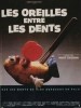 Les oreilles entre les dents