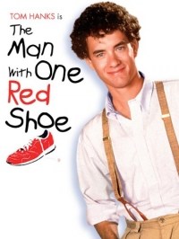 El hombre con un zapato rojo